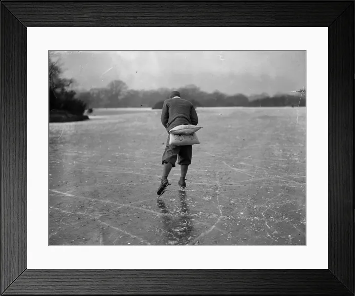 Framed Print : Cushioned. December 1927: A skater not too sure of his abilities has padded Framed Print : Cushioned. December 1927: A skater not too sure of his abilities has padded