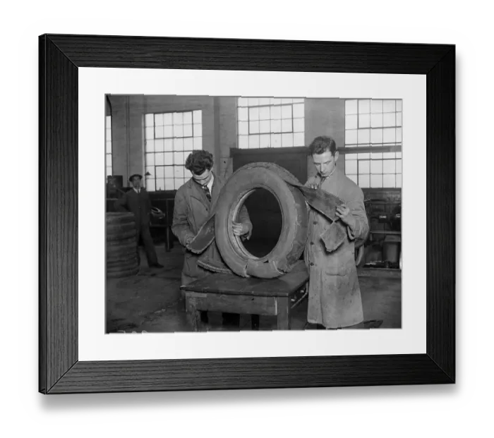 Framed Print : Tyre Test. February 1926: Examining the tread of a tyre in the Dunlop factory Framed Print : Tyre Test. February 1926: Examining the tread of a tyre in the Dunlop factory
