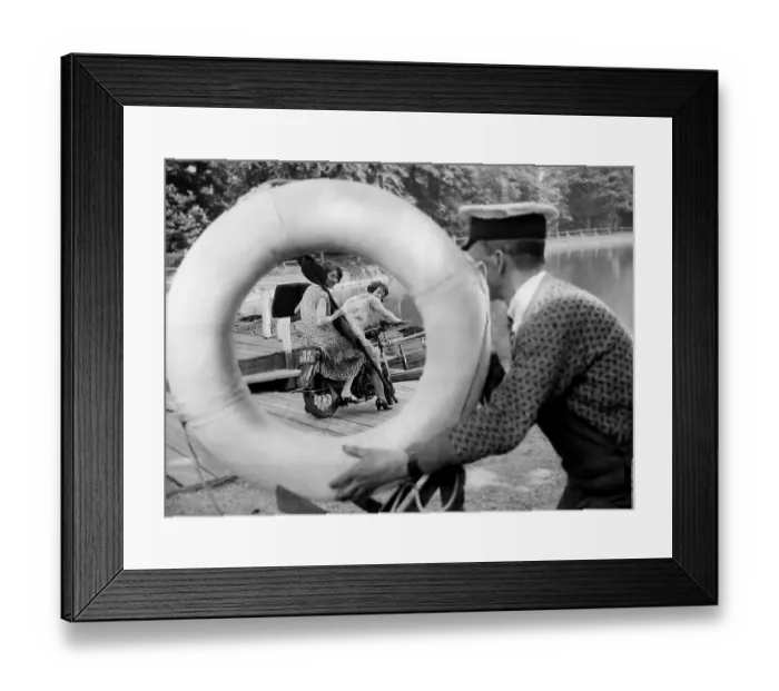 Framed Print : Framed. May 1927: The Misses Debenham framed by a lifebelt as they ride Framed Print : Framed. May 1927: The Misses Debenham framed by a lifebelt as they ride