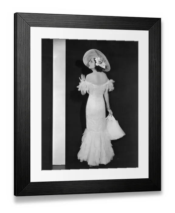 Framed Print : Mandalay. 1934: Kay Francis (1899 - 1968) wears a day dress of pale pink Framed Print : Mandalay. 1934: Kay Francis (1899 - 1968) wears a day dress of pale pink