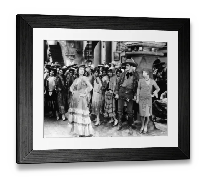 Framed Print : Myrna Loy. circa 1934: American actress Myrna Loy struts her stuff in a Mexican bar scene