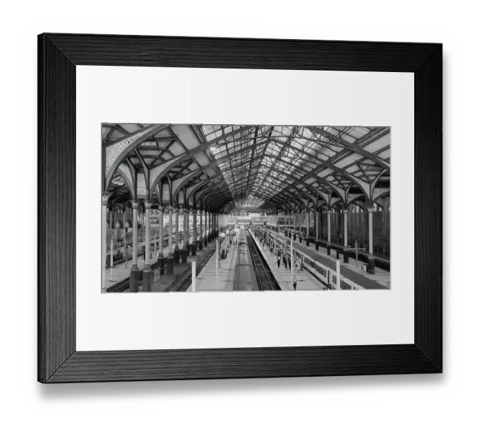 Framed Print : Black and white photograph of railroad tracks and platforms, interiors of Liverpool Street Station in London, England Framed Print : Black and white photograph of railroad tracks and platforms, interiors of Liverpool Street Station in London, England