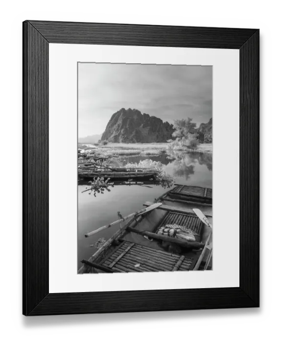 Framed Print : An infrared image of traditional bamboo boats on the waterways of Ninh Binh in Vietnam Framed Print : An infrared image of traditional bamboo boats on the waterways of Ninh Binh in Vietnam