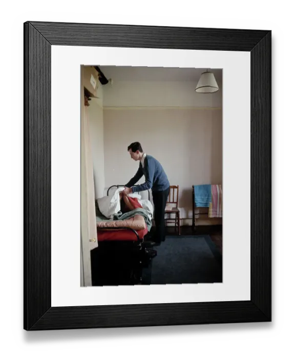 Framed Print : Student Making His Bed