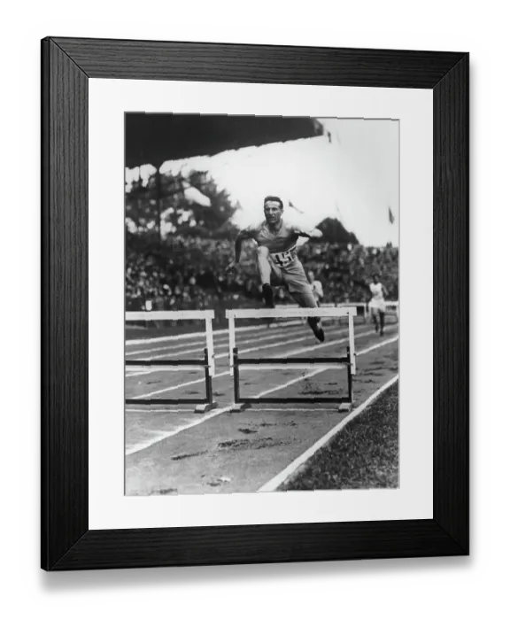 Framed Print : Geo Andre Jumping Hurdles At The Paris Olympics