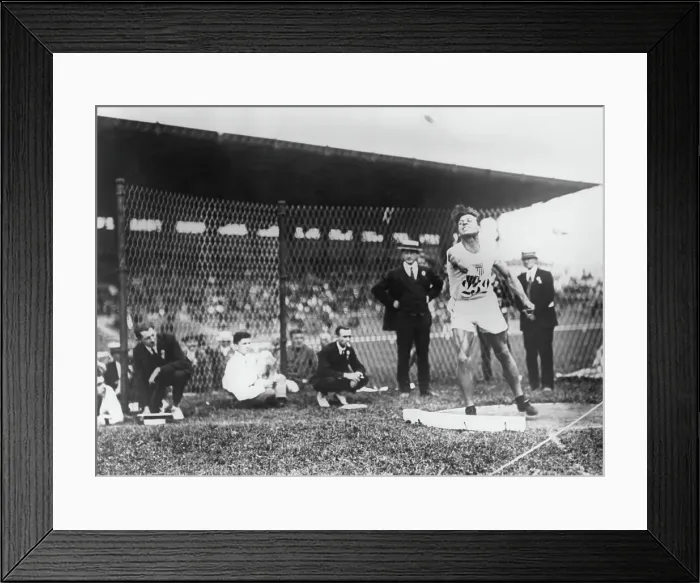 Framed Print : Bud Houser Throws The Shot Put At The Paris Olympics Framed Print : Bud Houser Throws The Shot Put At The Paris Olympics