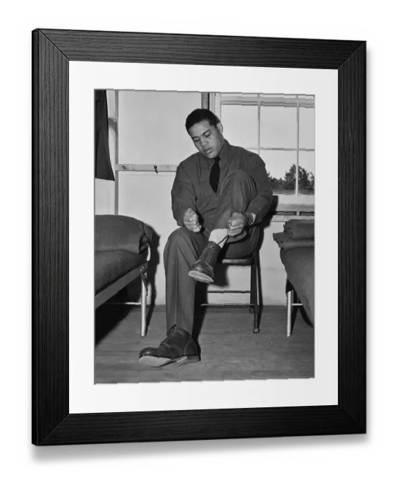 Framed Print : Joe Louis. American boxing champion Joe Louis tying a shoelace in his US Framed Print : Joe Louis. American boxing champion Joe Louis tying a shoelace in his US