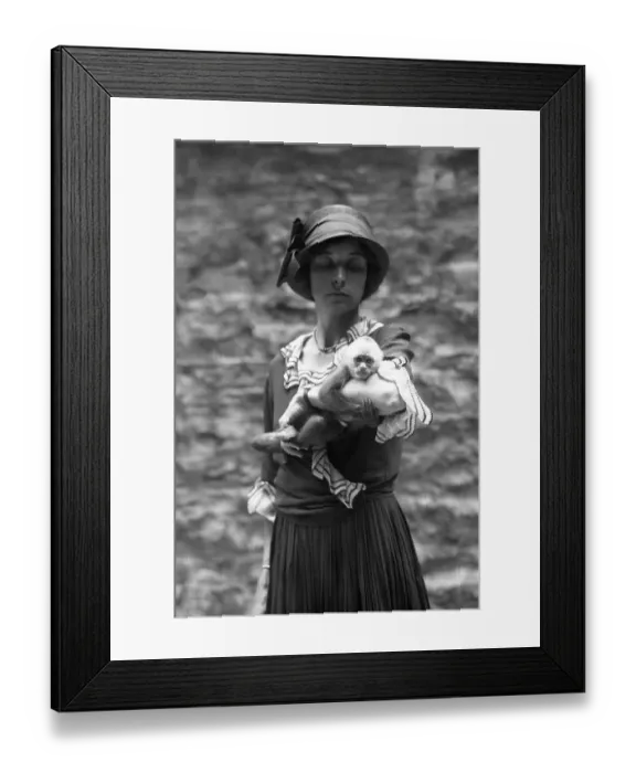 Framed Print : Ruth Rose Holding A White Faced Cebus Monkey Framed Print : Ruth Rose Holding A White Faced Cebus Monkey