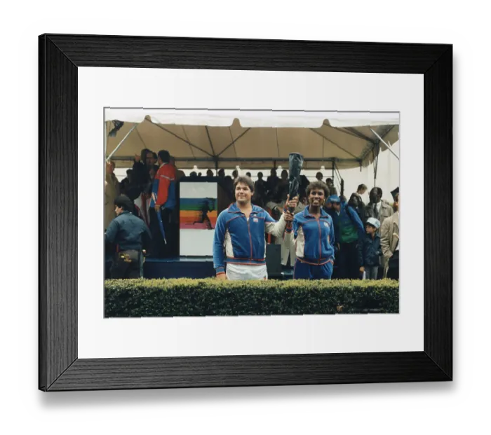 Framed Print : Grandchildren Of Jesse Owens And Jim Thorpe With Olympic Torch