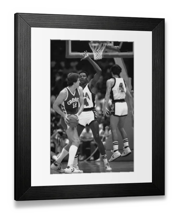 Framed Print : U.S.A.'s Steve Alford Attempts To Block Bill Wennington Of Canada Framed Print : U.S.A.'s Steve Alford Attempts To Block Bill Wennington Of Canada