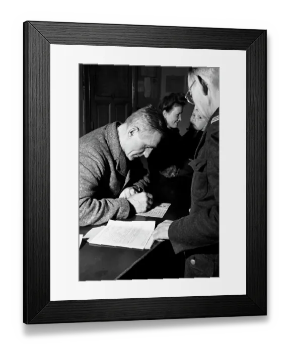 Framed Print : Man Signs Identity Card In Soviet Sector Framed Print : Man Signs Identity Card In Soviet Sector