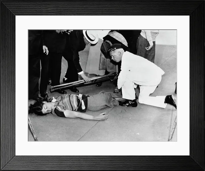 Framed Print : Woman On The Ground At Protest Framed Print : Woman On The Ground At Protest