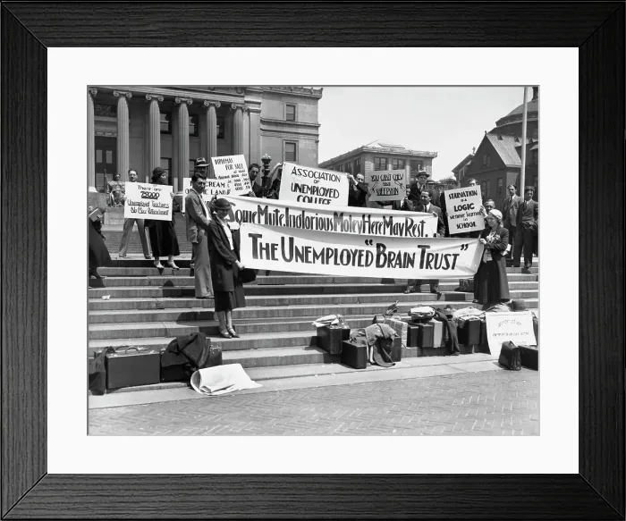 Framed Print : Unemployed Graduates With Banners Framed Print : Unemployed Graduates With Banners