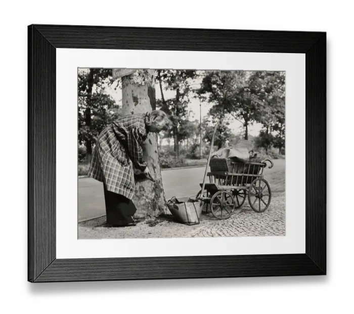 Framed Print : Woman Stripping Bark From Tree Framed Print : Woman Stripping Bark From Tree
