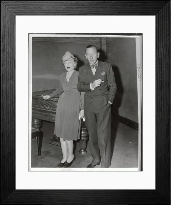 Framed Print : Noel Coward with Neysa McMein Attending Theater Framed Print : Noel Coward with Neysa McMein Attending Theater