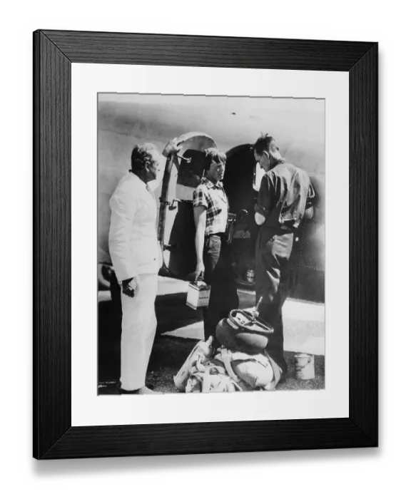 Framed Print : Amelia Earhart and Fred Noonan Standing by Airplane Framed Print : Amelia Earhart and Fred Noonan Standing by Airplane
