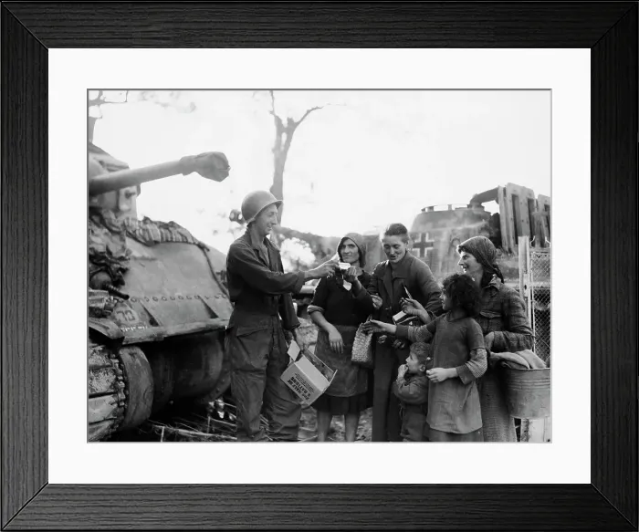 Framed Print : US Soldier Handing Out Army Rations Framed Print : US Soldier Handing Out Army Rations