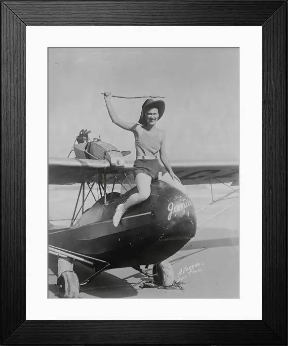 Framed Print : Girl Atop a Plane Framed Print : Girl Atop a Plane