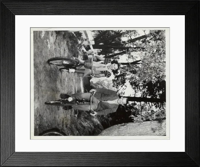 Framed Print : Paulette Goddard and Douglas Fairbanks Jr Riding Bicycles Framed Print : Paulette Goddard and Douglas Fairbanks Jr Riding Bicycles