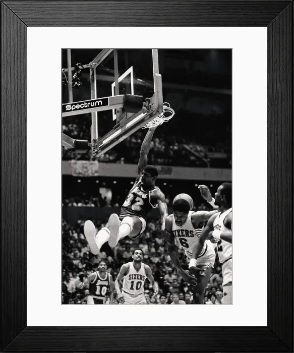 Framed Print : Magic Johnson Hanging on to Net Framed Print : Magic Johnson Hanging on to Net