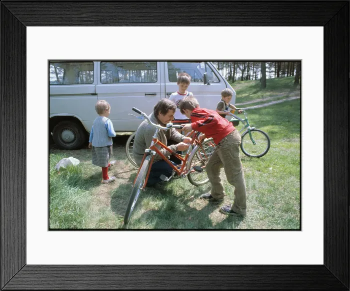 Framed Print : Lech Walesa Adjusting Bicycle Framed Print : Lech Walesa Adjusting Bicycle