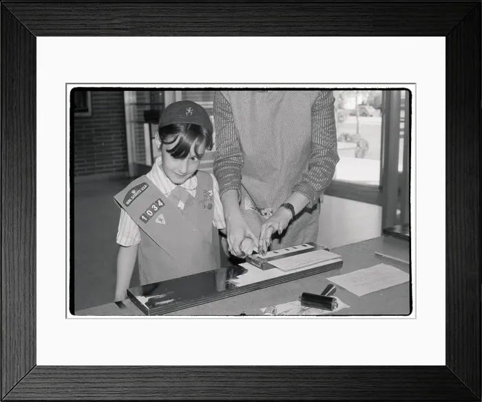 Framed Print : Brownie Scout Getting Fingerprinted