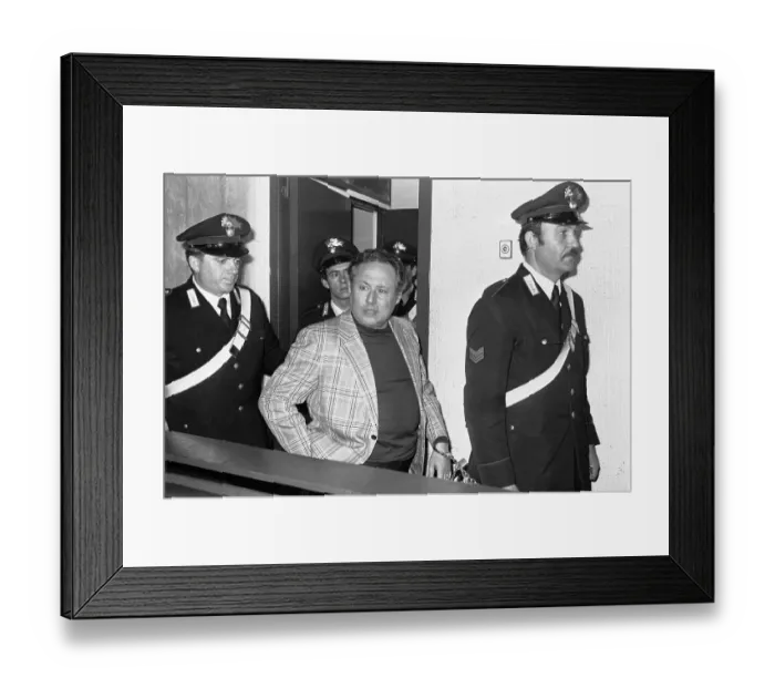 Framed Print : Police Officers Escorting Luciano Liggio Framed Print : Police Officers Escorting Luciano Liggio