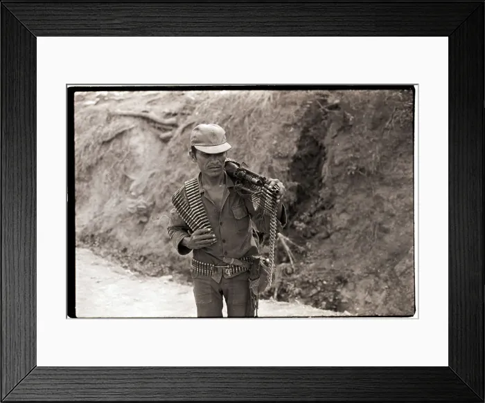 Framed Print : Guerrilla Carrying M-60 and Ammunition Framed Print : Guerrilla Carrying M-60 and Ammunition