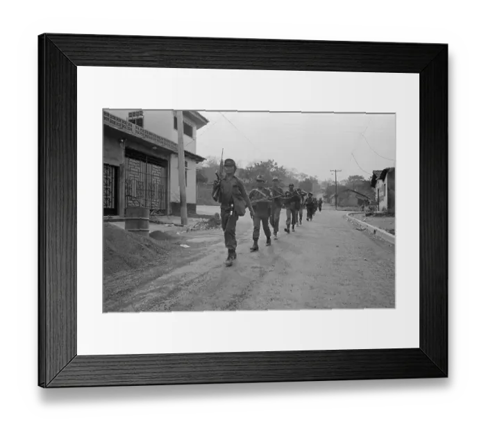 Framed Print : Guerrillas Marching into an El Salvador City Framed Print : Guerrillas Marching into an El Salvador City