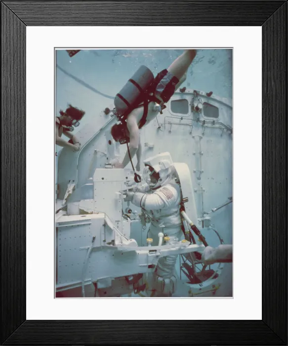 Framed Print : Robert L. Stewart Simulating Weightless Environment in Space Framed Print : Robert L. Stewart Simulating Weightless Environment in Space