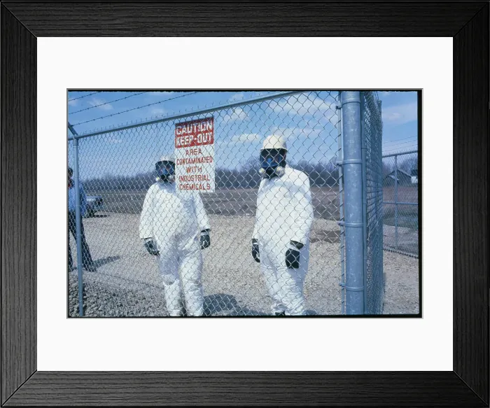 Framed Print : Uniformed Toxic Dump Workers Pausing Behind Fence Framed Print : Uniformed Toxic Dump Workers Pausing Behind Fence