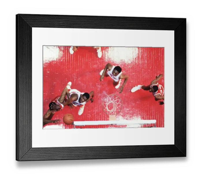 Framed Print : NCAA Basketball Game Players in Action Framed Print : NCAA Basketball Game Players in Action