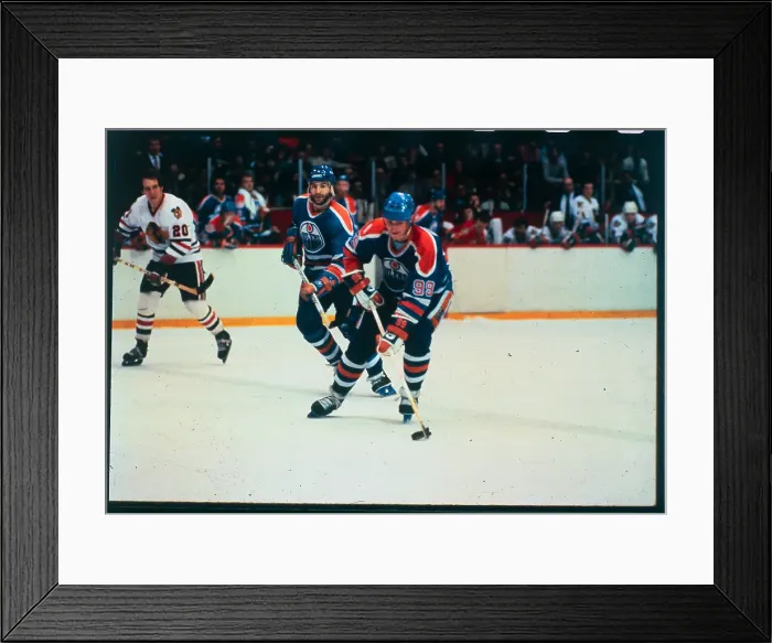 Framed Print : Oiler Hockey Players Skating in Game Framed Print : Oiler Hockey Players Skating in Game