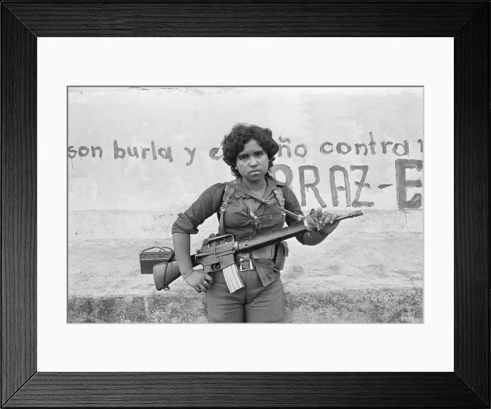 Framed Print : Guerrilla Woman With Gun Stands Guard Framed Print : Guerrilla Woman With Gun Stands Guard