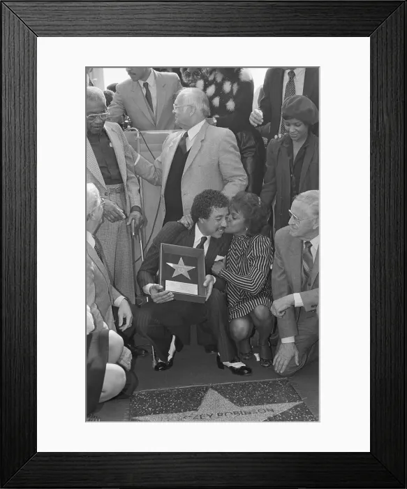 Framed Print : Smokey Robinson Receives Kiss From Wife Framed Print : Smokey Robinson Receives Kiss From Wife