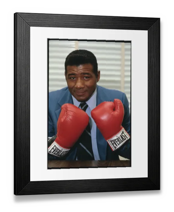 Framed Print : Floyd Patterson Wearing Boxing Gloves