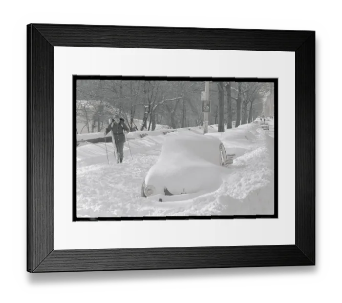 Framed Print : Pedestrian Using Skis to Travel Snowbound City Street Framed Print : Pedestrian Using Skis to Travel Snowbound City Street