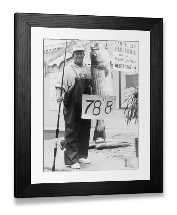 Framed Print : Fisherman with Record Striped Bass Framed Print : Fisherman with Record Striped Bass