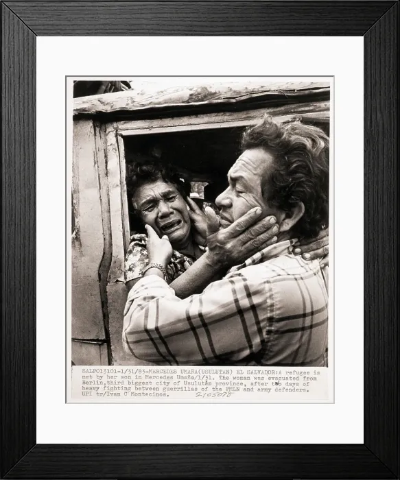 Framed Print : Refugee Woman Embracing Her Son Framed Print : Refugee Woman Embracing Her Son