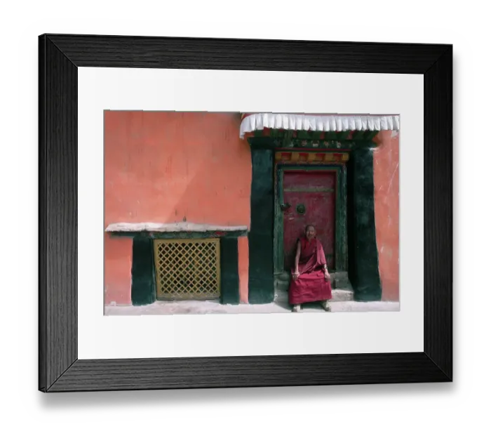Framed Print : Buddhist Monk Sitting in Temple Doorway Framed Print : Buddhist Monk Sitting in Temple Doorway