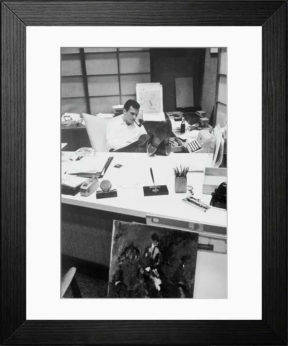 Framed Print : Hugh Hefner at Work in His Office