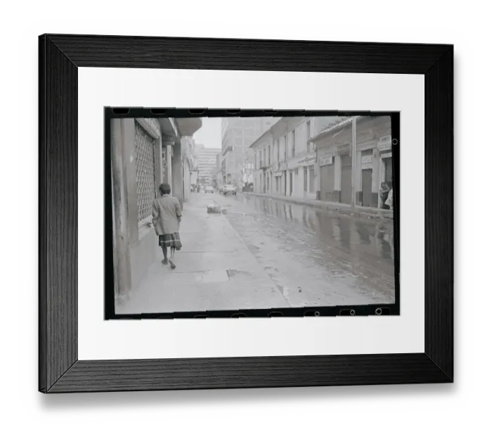 Framed Print : Child Strolling Down a Street Framed Print : Child Strolling Down a Street