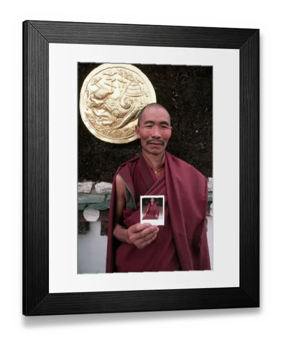 Framed Print : Buddhist Monk Holds Polaroid Photo Framed Print : Buddhist Monk Holds Polaroid Photo