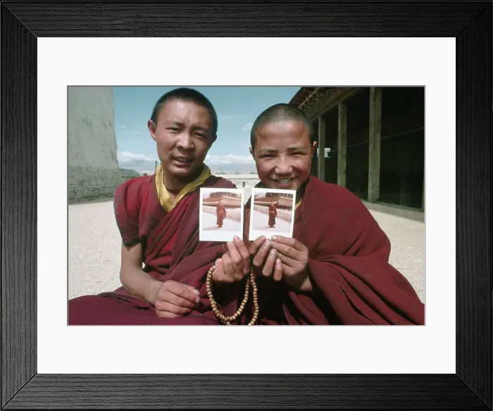 Framed Print : Buddhist Monks Holding Polaroid Photos Framed Print : Buddhist Monks Holding Polaroid Photos
