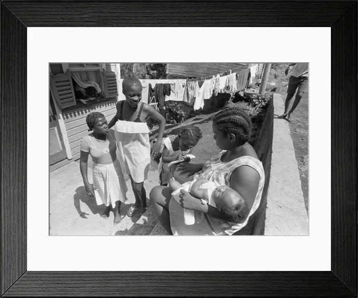 Framed Print : Woman Relaxes with Children on Porch Framed Print : Woman Relaxes with Children on Porch
