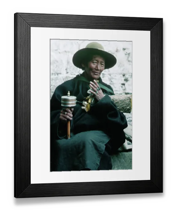 Framed Print : Tibetan Woman Spinning Prayer Wheel Framed Print : Tibetan Woman Spinning Prayer Wheel