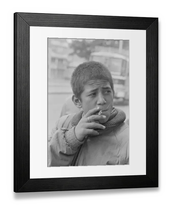 Framed Print : Boy Smoking a Cigarette Framed Print : Boy Smoking a Cigarette