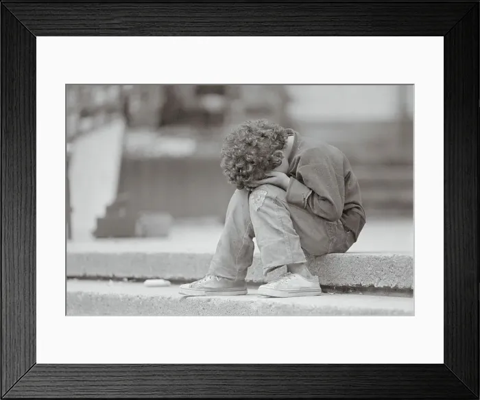 Framed Print : Young Boy Sleeping in the Street Framed Print : Young Boy Sleeping in the Street