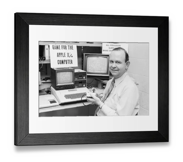 Framed Print : Game Inventor with Apple Computer Framed Print : Game Inventor with Apple Computer