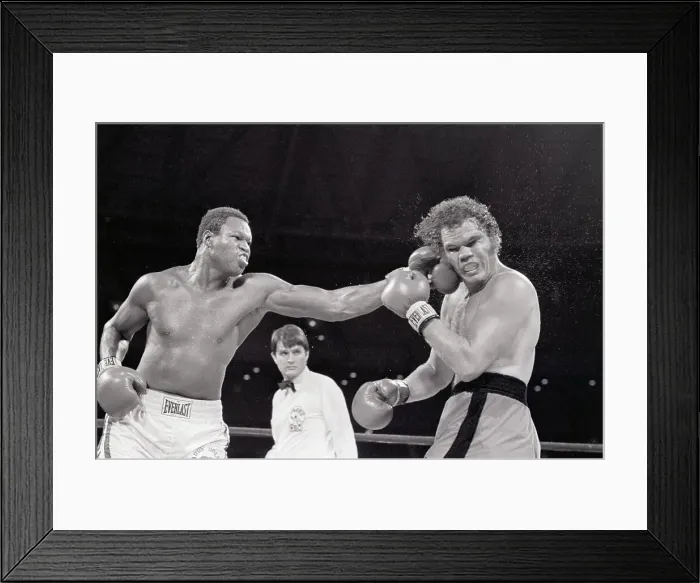 Framed Print : Larry Holmes Punches Randy Tex Cobb